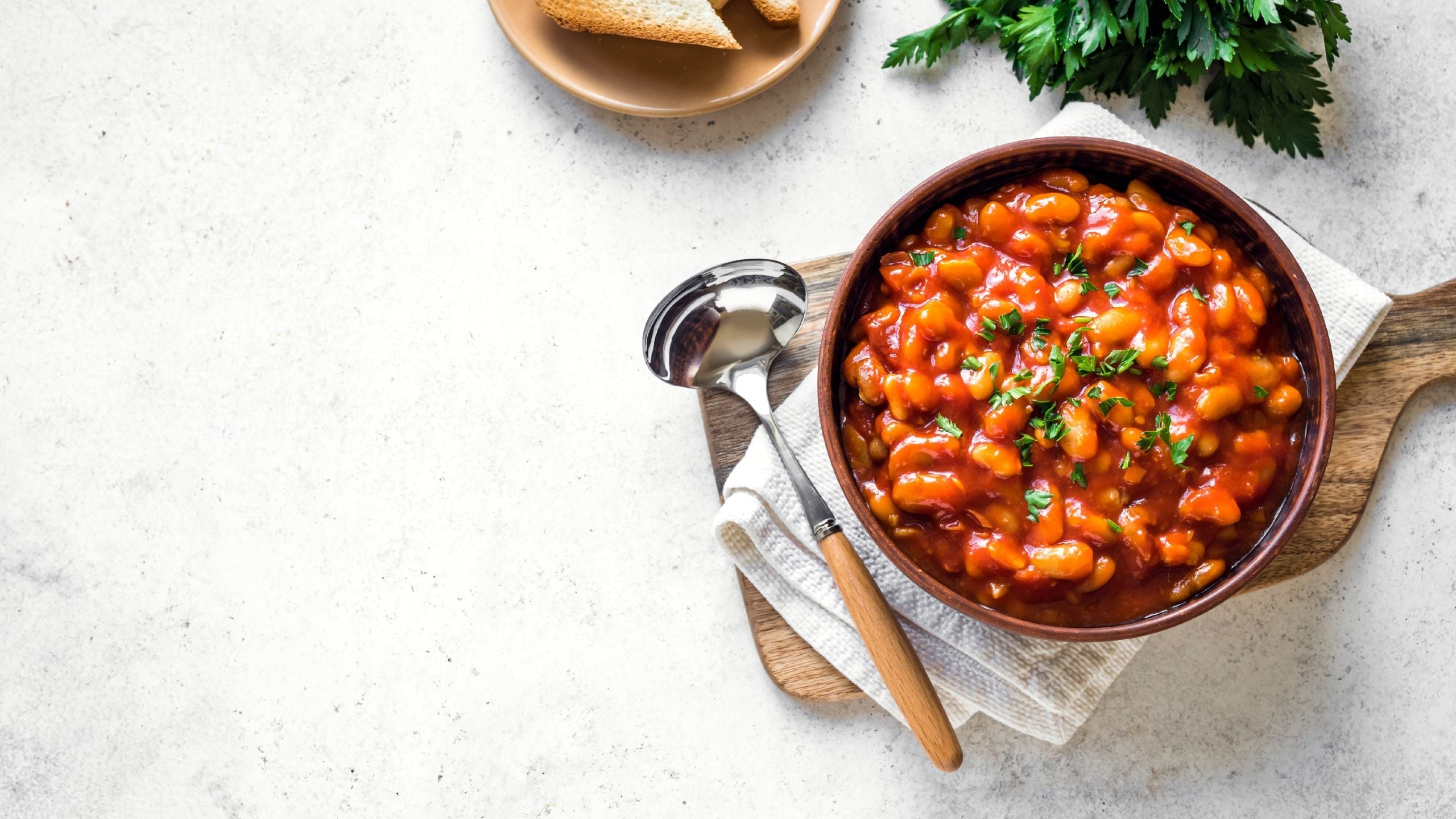 chili on a wooden cutting board