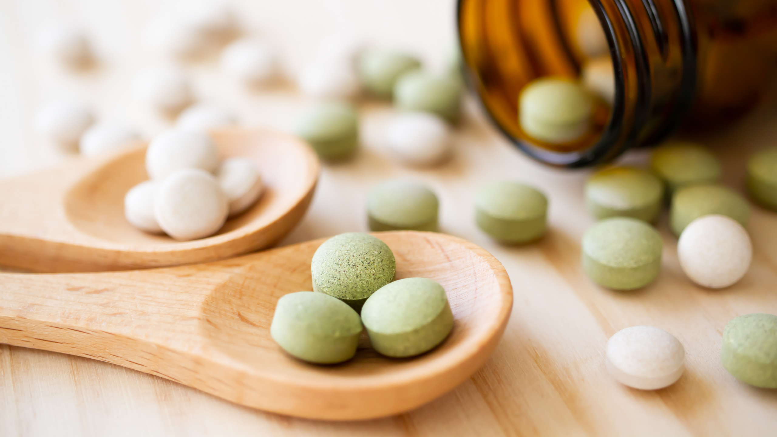 supplements near a pill bottle