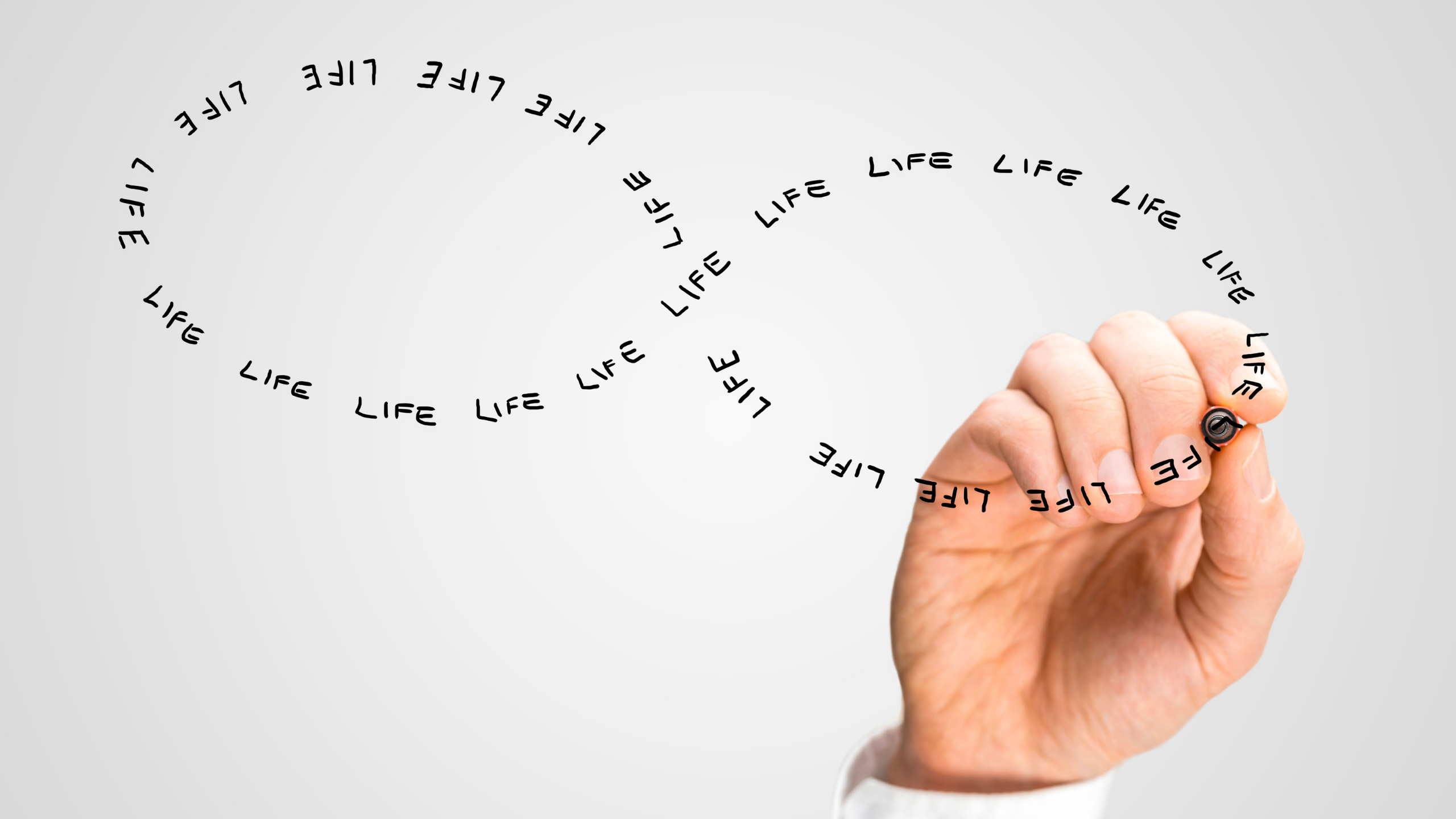 drawing an infinity sign with a black pen