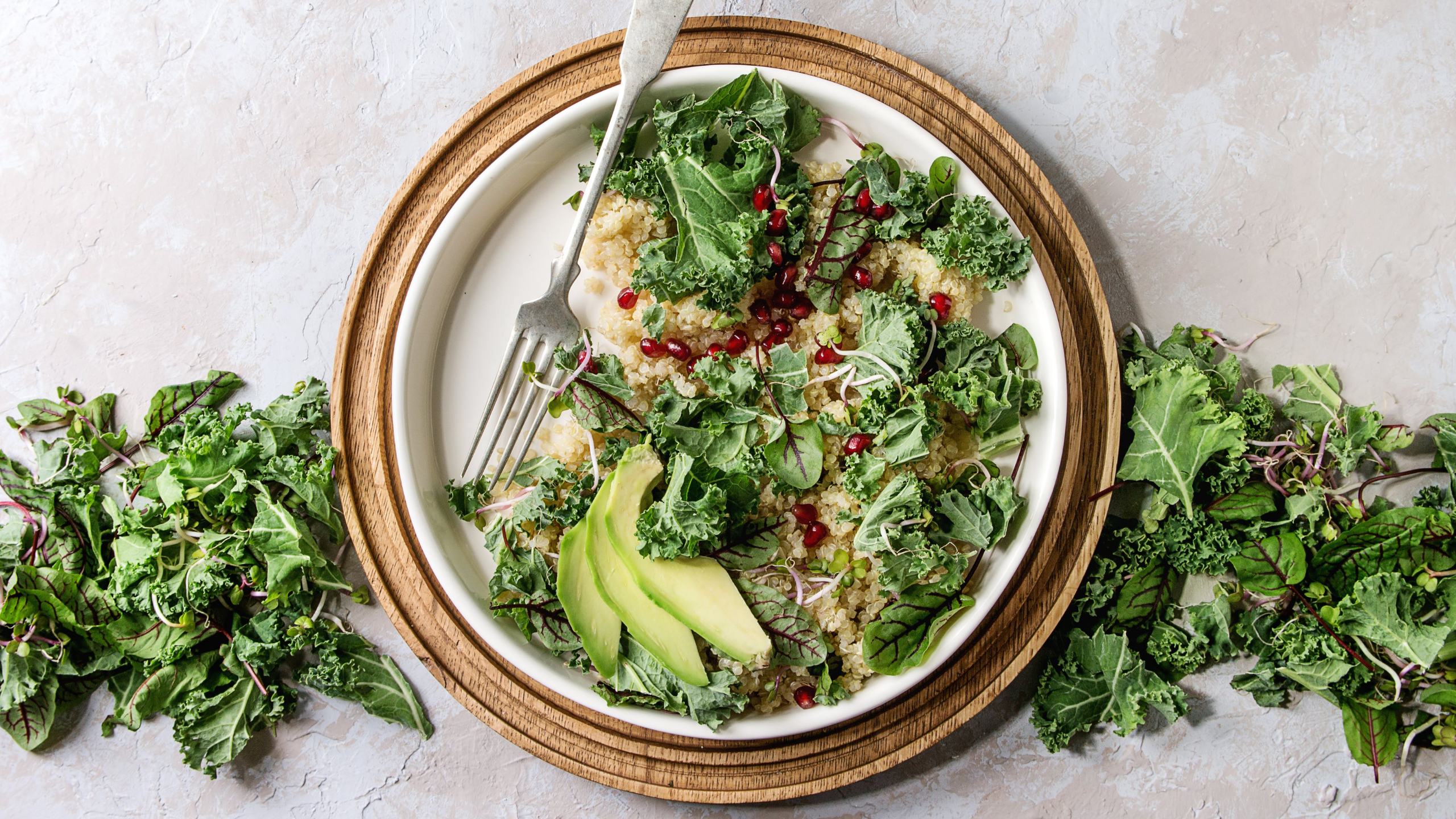 kale salad with quinoa and pomegranates
